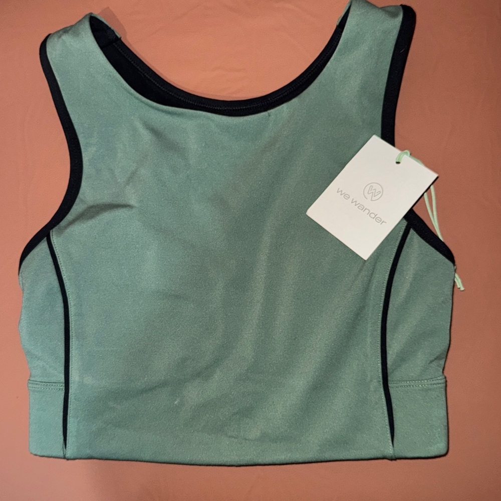We Wander Green and Black racer back sports Bra. New.  Small.